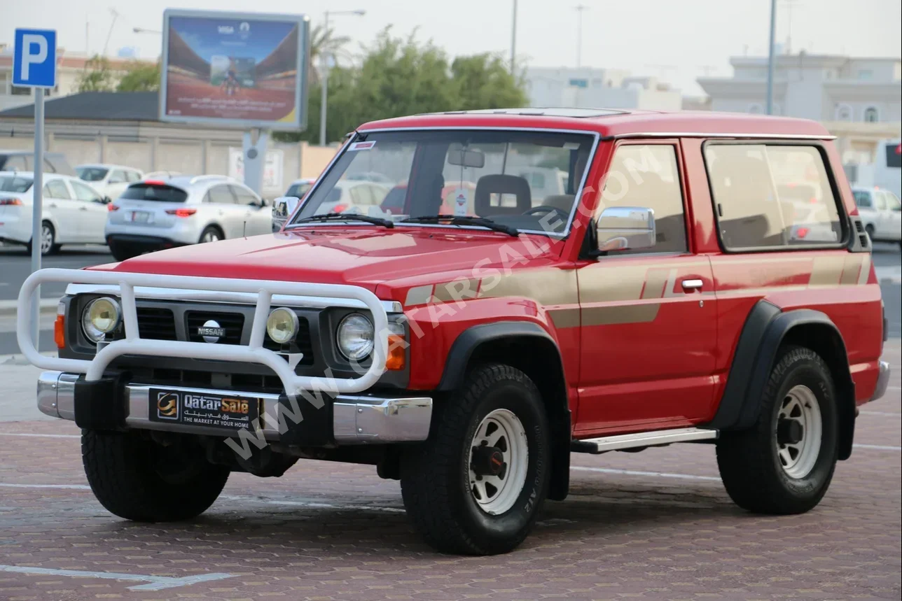 Nissan  Patrol  1991  Automatic  277,000 Km  6 Cylinder  Four Wheel Drive (4WD)  SUV  Red