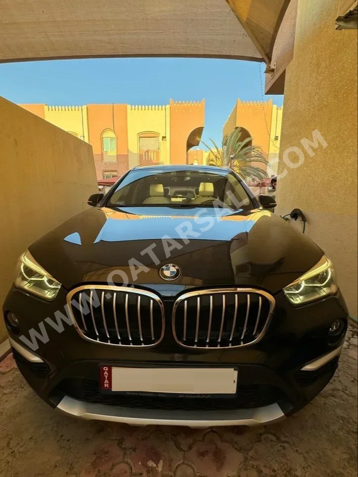 BMW  X-Series  X1  2018  Automatic  102,500 Km  4 Cylinder  Four Wheel Drive (4WD)  SUV  Black  With Warranty