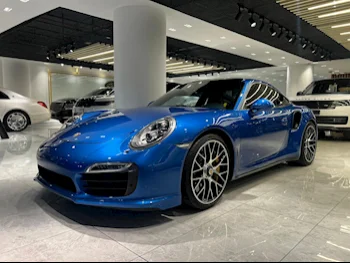  Porsche  911  Turbo  2015  Automatic  65,000 Km  6 Cylinder  Rear Wheel Drive (RWD)  Coupe / Sport  Blue  With Warranty