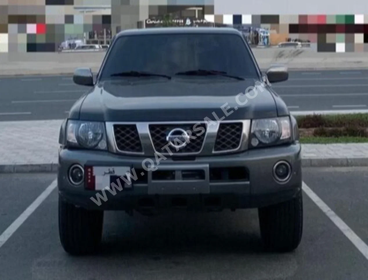 Nissan  Patrol  Safari  2021  Manual  66,000 Km  6 Cylinder  Four Wheel Drive (4WD)  SUV  Black and Gray  With Warranty