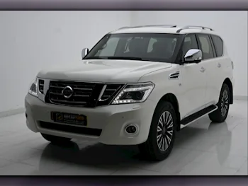 Nissan  Patrol  Platinum  2015  Automatic  198,000 Km  8 Cylinder  Four Wheel Drive (4WD)  SUV  White