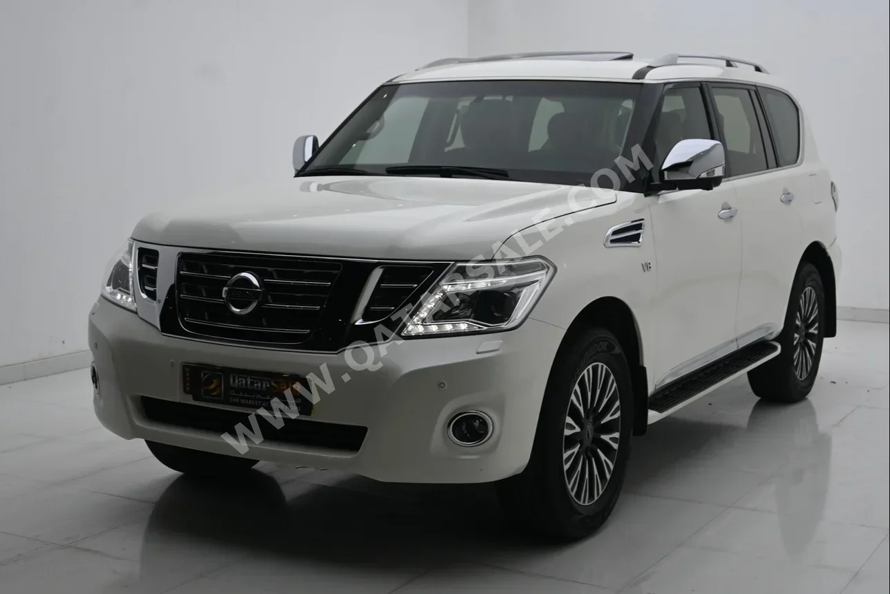 Nissan  Patrol  Platinum  2015  Automatic  198,000 Km  8 Cylinder  Four Wheel Drive (4WD)  SUV  White