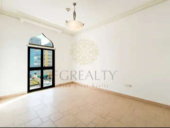 2 Bedrooms  Apartment  For Rent  in Doha -  The Pearl  Not Furnished