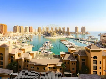 2 Bedrooms  Apartment  For Rent  in Doha -  The Pearl  Not Furnished