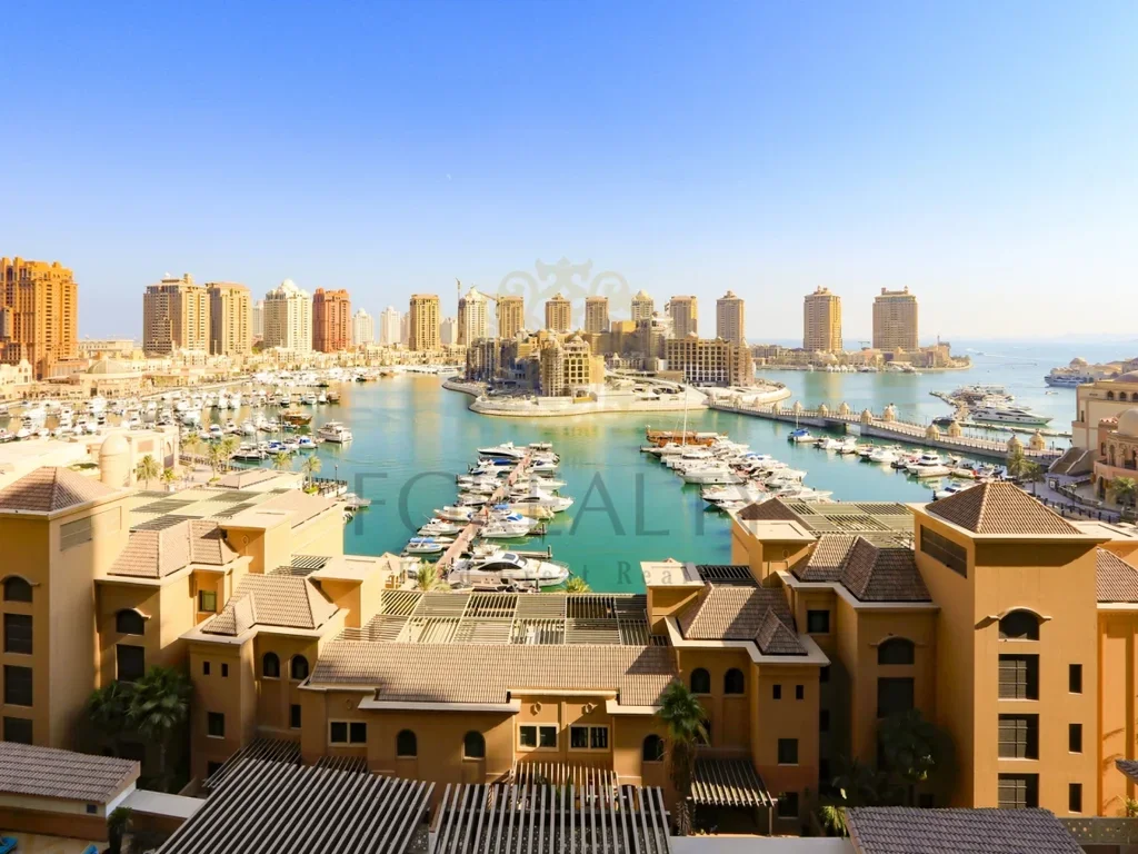 2 Bedrooms  Apartment  For Rent  in Doha -  The Pearl  Not Furnished