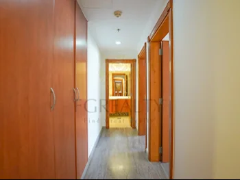 3 Bedrooms  Apartment  For Rent  in Doha -  The Pearl  Not Furnished