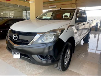 Mazda  BT-50  2016  Manual  180,000 Km  4 Cylinder  Four Wheel Drive (4WD)  Pick Up  White