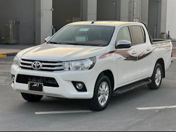 Toyota  Hilux  2023  Automatic  12,000 Km  4 Cylinder  Four Wheel Drive (4WD)  Pick Up  White  With Warranty