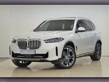 BMW  X-Series  X5 40i  2024  Automatic  450 Km  6 Cylinder  All Wheel Drive (AWD)  SUV  White  With Warranty