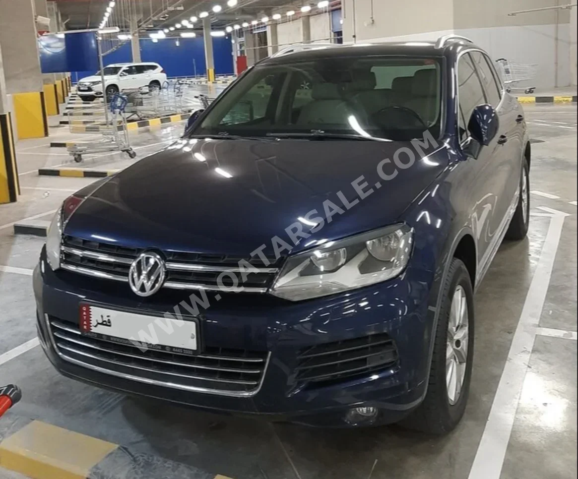 Volkswagen  Touareg  2015  Automatic  115,000 Km  6 Cylinder  All Wheel Drive (AWD)  SUV  Blue