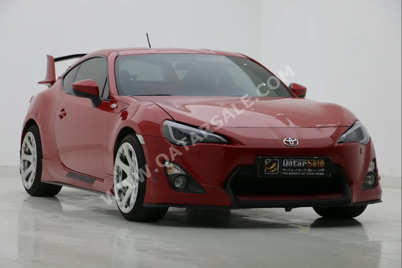  Toyota  GT 86  2013  Automatic  65,000 Km  4 Cylinder  Rear Wheel Drive (RWD)  Coupe / Sport  Red  With Warranty