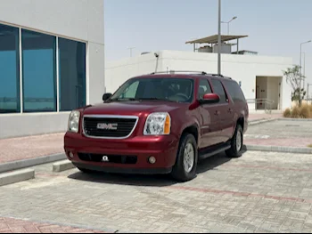 GMC  Yukon  XL  2009  Automatic  305٬000 Km  8 Cylinder  Four Wheel Drive (4WD)  SUV  Red