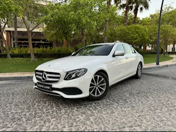 Mercedes-Benz  E-Class  200  2019  Automatic  60,000 Km  4 Cylinder  Rear Wheel Drive (RWD)  Sedan  White