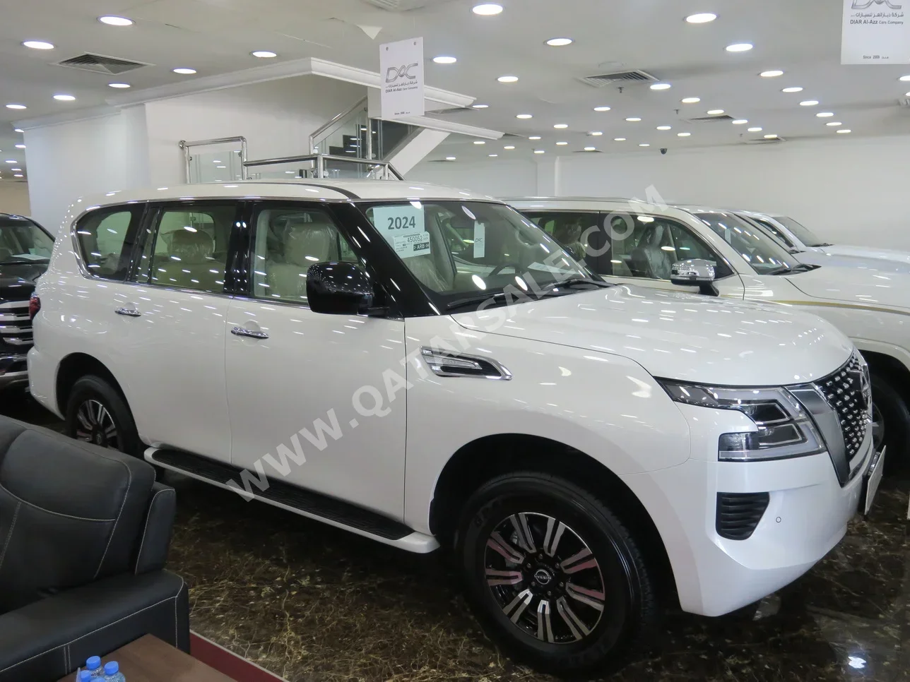  Nissan  Patrol  XE  2024  Automatic  0 Km  6 Cylinder  Four Wheel Drive (4WD)  SUV  White  With Warranty