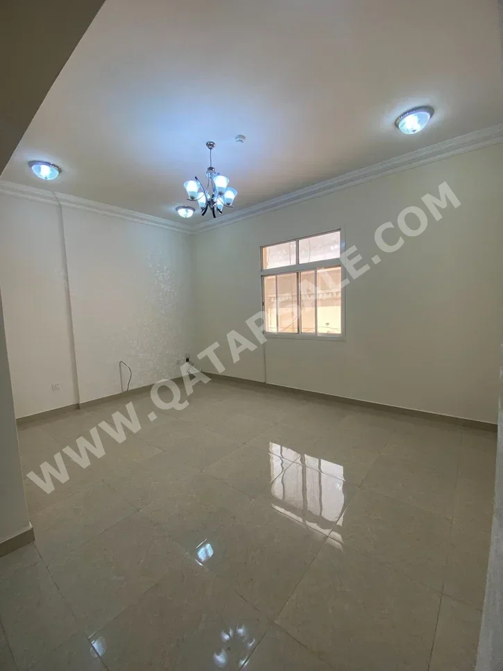 2 Bedrooms  Apartment  For Rent  in Doha -  Madinat Khalifa South  Not Furnished