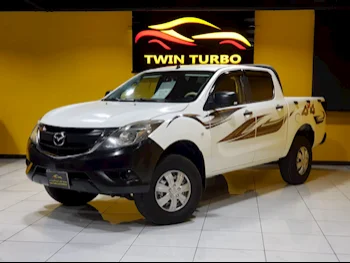 Mazda  BT-50  2016  Manual  185,000 Km  4 Cylinder  Front Wheel Drive (FWD)  Pick Up  White