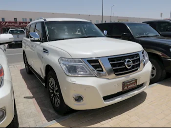 Nissan  Patrol  Platinum  2015  Automatic  250,000 Km  8 Cylinder  Four Wheel Drive (4WD)  SUV  White