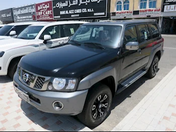 Nissan  Patrol  Super Safari  2023  Automatic  13,000 Km  6 Cylinder  Four Wheel Drive (4WD)  SUV  Black  With Warranty