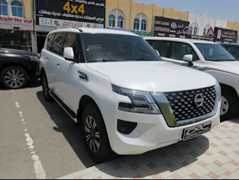 Nissan  Patrol  SE  2023  Automatic  1,000 Km  6 Cylinder  Four Wheel Drive (4WD)  SUV  White  With Warranty