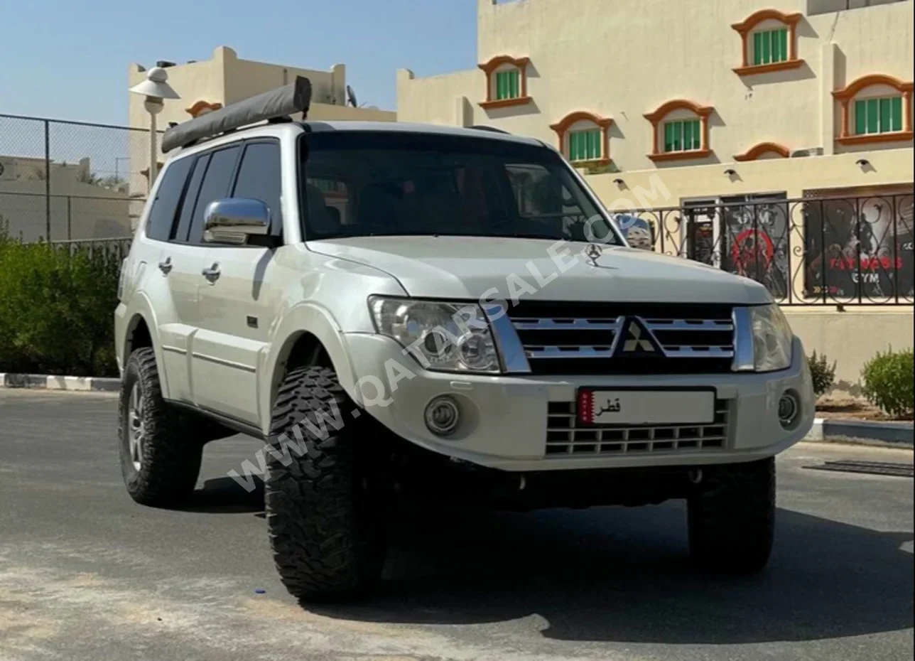 Mitsubishi  Pajero  3.8 Gold Edition  2014  Automatic  190,000 Km  6 Cylinder  Four Wheel Drive (4WD)  SUV  White