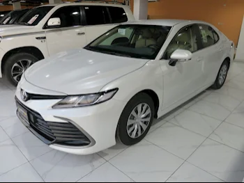 Toyota  Camry  LE  2024  Automatic  0 Km  4 Cylinder  Front Wheel Drive (FWD)  Sedan  White  With Warranty