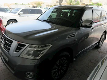 Nissan  Patrol  Platinum  2014  Automatic  220,000 Km  8 Cylinder  Four Wheel Drive (4WD)  SUV  Gray