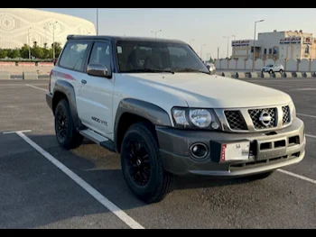 Nissan  Patrol  Super Safari  2019  Manual  53,000 Km  6 Cylinder  Rear Wheel Drive (RWD)  SUV  White