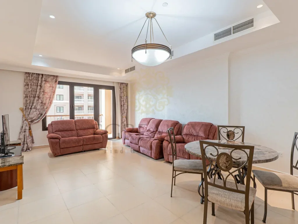 2 Bedrooms  Apartment  For Sale  in Doha -  The Pearl  Semi Furnished