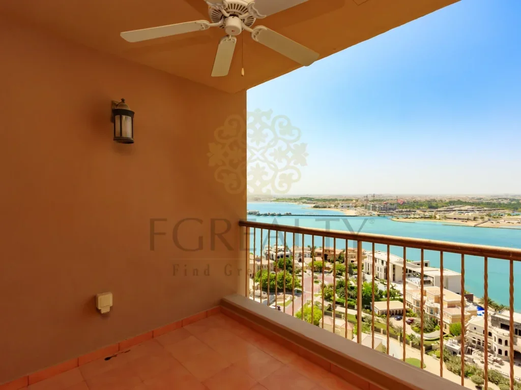 2 Bedrooms  Apartment  For Rent  in Doha -  The Pearl  Not Furnished