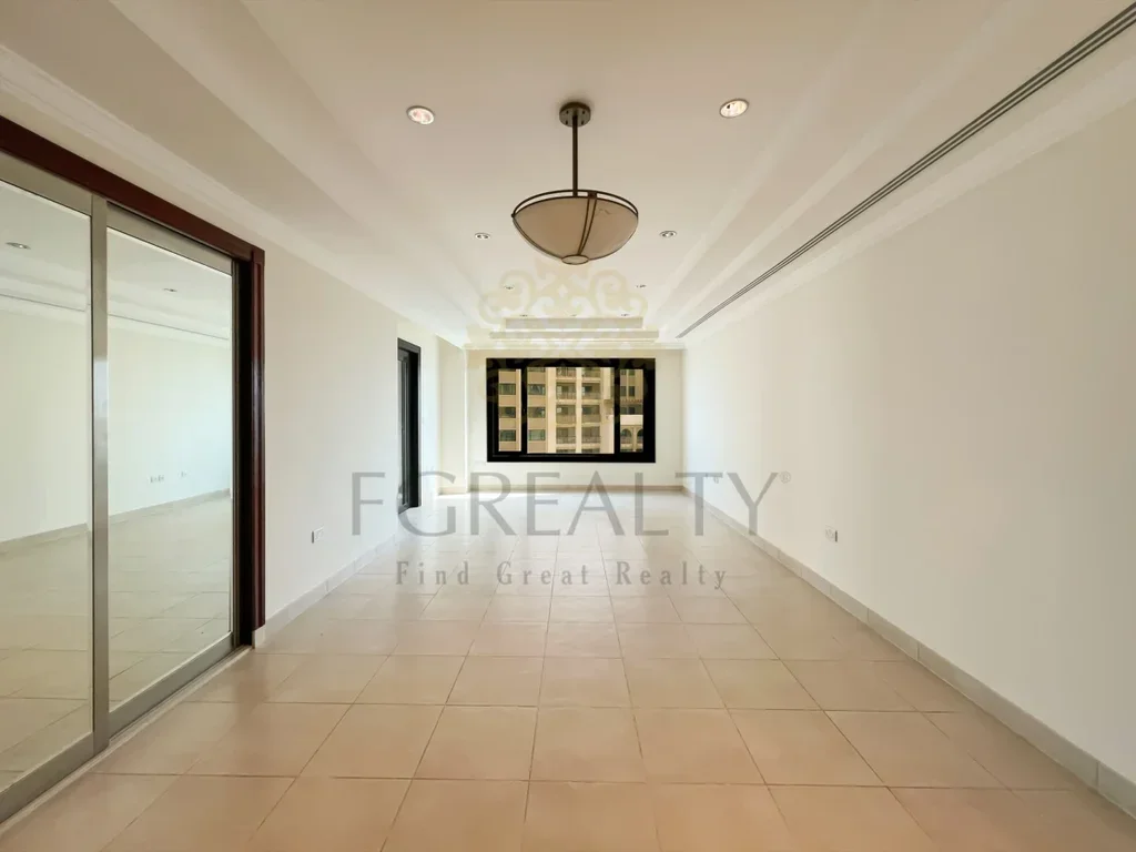 2 Bedrooms  Apartment  For Rent  in Doha -  The Pearl  Not Furnished