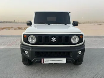 Suzuki  Jimny  2022  Automatic  51,000 Km  4 Cylinder  Four Wheel Drive (4WD)  SUV  White  With Warranty