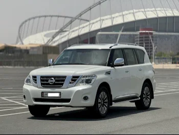 Nissan  Patrol  Platinum  2014  Automatic  165,000 Km  8 Cylinder  Four Wheel Drive (4WD)  SUV  White