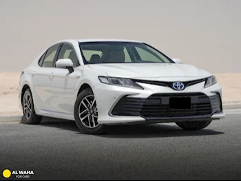 Toyota  Camry  Hybrid  2023  Automatic  65,000 Km  4 Cylinder  Front Wheel Drive (FWD)  Sedan  White  With Warranty
