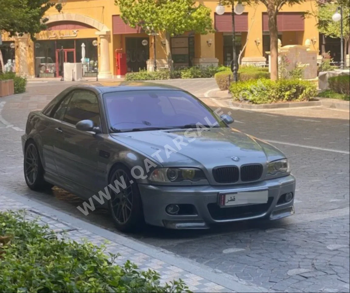 BMW  M-Series  3  2004  SMG  142,000 Km  6 Cylinder  Rear Wheel Drive (RWD)  Coupe / Sport  Gray