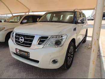 Nissan  Patrol  Platinum  2015  Automatic  230,000 Km  8 Cylinder  Four Wheel Drive (4WD)  SUV  White