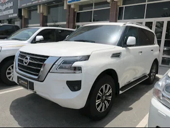 Nissan  Patrol  Titanium  2020  Automatic  120,000 Km  6 Cylinder  Four Wheel Drive (4WD)  SUV  White