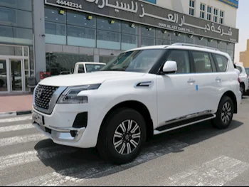 Nissan  Patrol  Titanium  2023  Automatic  0 Km  6 Cylinder  Four Wheel Drive (4WD)  SUV  White  With Warranty