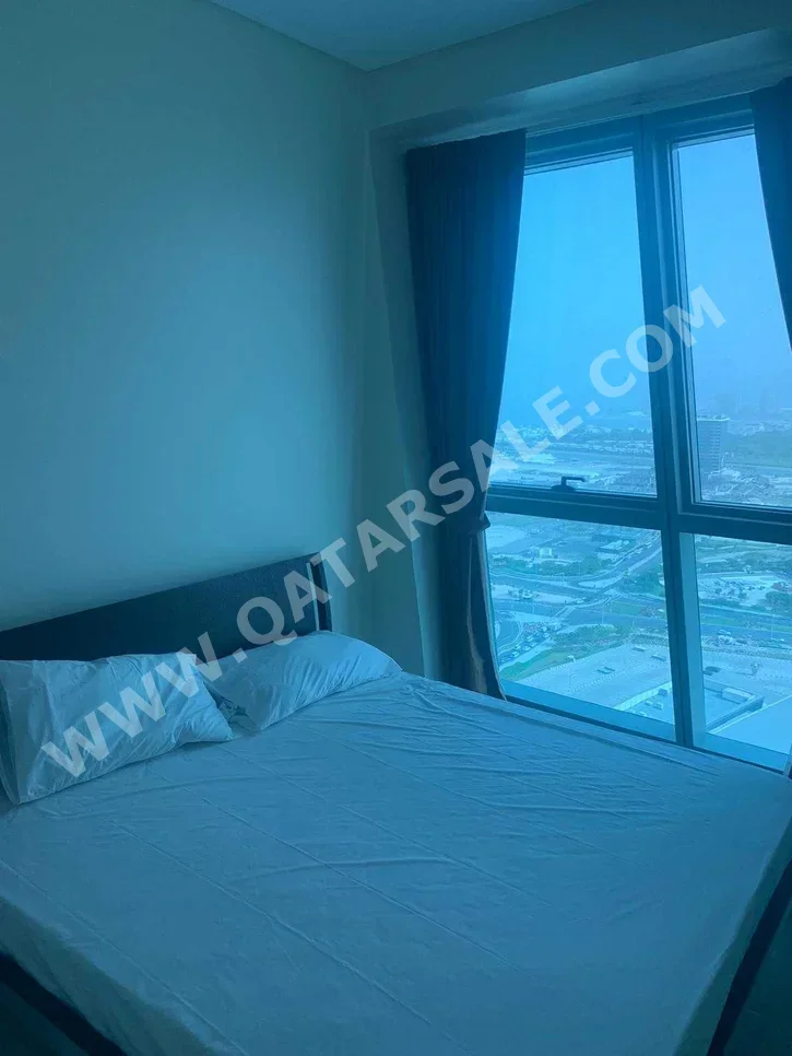 2 Bedrooms  Apartment  For Rent  in Doha -  The Pearl  Fully Furnished