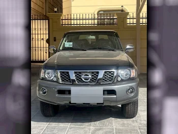 Nissan  Patrol  Super Safari  2024  Manual  0 Km  6 Cylinder  Four Wheel Drive (4WD)  SUV  Black and Gray  With Warranty