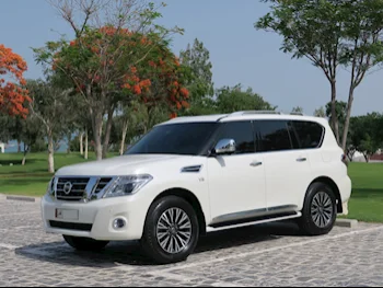 Nissan  Patrol  Platinum  2014  Automatic  167,000 Km  8 Cylinder  Four Wheel Drive (4WD)  SUV  White