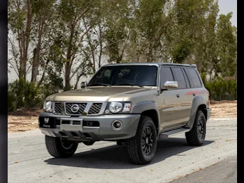 Nissan  Patrol  Super Safari  2018  Automatic  183,000 Km  6 Cylinder  Four Wheel Drive (4WD)  SUV  Gold