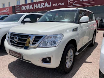 Nissan  Patrol  SE  2016  Automatic  214,000 Km  8 Cylinder  Four Wheel Drive (4WD)  SUV  White