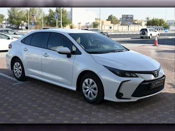 Toyota  Corolla  2021  Automatic  19,000 Km  4 Cylinder  Front Wheel Drive (FWD)  Sedan  White  With Warranty