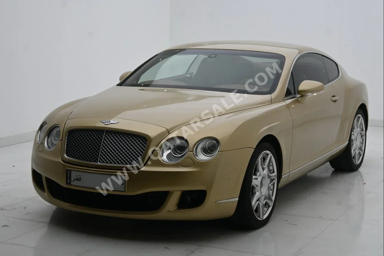 Bentley  Continental  GT  2009  Automatic  47,000 Km  12 Cylinder  All Wheel Drive (AWD)  Coupe / Sport  Gold