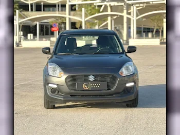 Suzuki  Swift  2020  Automatic  43,000 Km  4 Cylinder  Front Wheel Drive (FWD)  Hatchback  Dark Gray