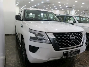 Nissan  Patrol  XE  2023  Automatic  0 Km  6 Cylinder  Four Wheel Drive (4WD)  SUV  White  With Warranty