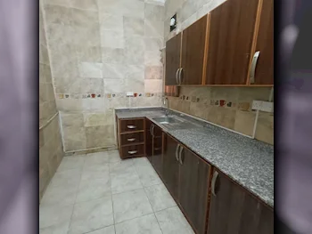 3 Bedrooms  Apartment  For Rent  in Umm Salal -  Al Kharaitiyat  Not Furnished