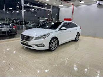 Hyundai  Sonata  2015  Automatic  204,000 Km  4 Cylinder  Front Wheel Drive (FWD)  Sedan  White