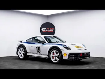 Porsche  911  Dakar  2023  Automatic  480 Km  6 Cylinder  All Wheel Drive (AWD)  Coupe / Sport  White and Blue  With Warranty