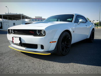 دودج  تشالنجر  ار تي سكات باك وايدبودي  2023  اوتوماتيك  0 كم  8 سلندر  دفع خلفي  كوبيه \ سبورت  أبيض  تحت الضمان